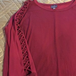 Burgundy top with lace up look on sleeves